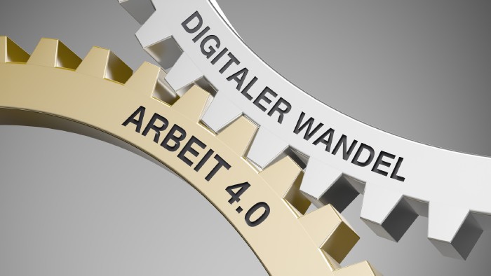 zwei Zahnräder mit der Aufschrift digitaler Wandel und Arbeit 4.0